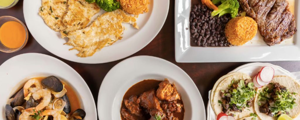 top view of an array of plated Mexican dishes