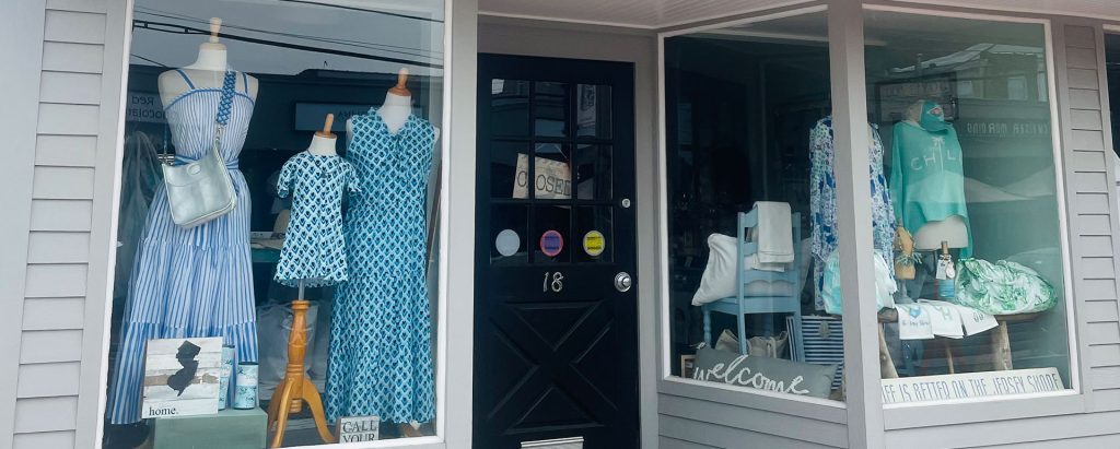 exterior windows of Cabana 19 showing summery women's apparel